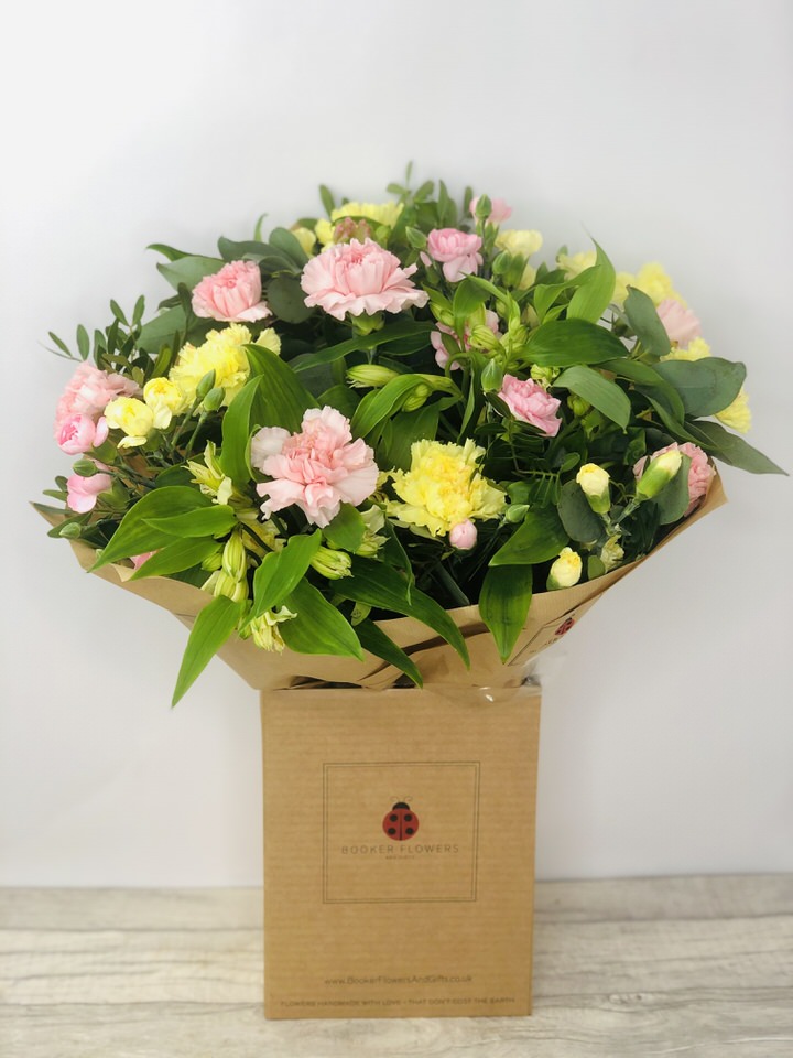 <h2>Pink and Yellow Classic Carnations - Spring Handtied Bouquet</h2>
<br>
<ul>
<li>Approximate Dimensions of Bouquet: 50cm x 30cm</li>
<li>Flowers arranged by hand and gift wrapped in our signature eco-friendly packaging and finished off with a hidden wooden ladybird</li>
<li>To give you the best occasionally we may make substitutes</li>
<li>Our flowers backed by our 7 days freshness guarantee</li>
<li>For delivery area coverage see below</li>
</ul>
<br>
<h2>Flower Delivery Coverage</h2>
<p>Our shop delivers flowers to the following Liverpool postcodes L1 L2 L3 L4 L5 L6 L7 L8 L11 L12 L13 L14 L15 L16 L17 L18 L19 L24 L25 L26 L27 L36 L70 If your order is for an area outside of these we can organise delivery for you through our network of florists. We will ask them to make as close as possible to the image but because of the difference in stock and sundry items it may not be exact.</p>
<br>
<h2>Hand-tied Bouquet | Flowers in Water</h2>
<br>
<p>These beautiful Spring flowers hand-arranged by our professional florists into a hand-tied bouquet are a delightful choice from our new Spring collection. This bouquet of pink and yellow classic carnations, spray carnations and British Grown Alstroemeria would make the perfect gift to let someone know you are thinking of them.</p>
<br>
<p>Handtied bouquets are a lovely display of fresh flowers that have the wow factor. The advantage of having a bouquet made this way is that they are artfully arranged by our professional florists and tied so that they stay in the display.</p>
<br>
<p>They are then gift wrapped and aqua packed in a water bubble so that at no point are the flowers out of water. This means they look their very best on the day they arrive and continue to delight for days after.</p>
<br>
<p>Being delivered in a transporter box and in water means the recipient does not need to put the flowers in a vase straight away they can just put them down and enjoy.</p>
<br>
<p>The bouquet features 5 pink carnations, 5 yellow carnations, 5 pink spray carnations, 5 yellow spray carnations, 2 yellow alstroemeria together with 2 pink alstroemeria hand-arranged with mixed foliage.</p>
<br>
<h2>Eco-Friendly Liverpool Florists</h2>
<p>As florists we feel very close earth and want to protect it. Plastic waste is a huge problem in the florist industry so we made the decision to make our packaging eco-friendly.</p>
<p>To achieve this we worked with our packaging supplier to remove the lamination off our boxes and wrap the tops in an Eco Flowerwrap which means it easily compostable or can be fully recycled.</p>
<p>Once you have finished enjoying your flowers from us they will go back into growing more flowers! Only a small amount of plastic is used as a water bubble and this is biodegradable.</p>
<p>Even the sachet of flower food included with your bouquet is compostable.</p>
<p>All our bouquets have a small wooden ladybird hidden amongst them so do not forget to spot the ladybird and post a picture on our social media pages to enter our rolling competition.</p>
<br>
<h2>Flowers Guaranteed for 7 Days</h2>
<p>Our 7-day freshness guarantee should give you confidence that we will only send out good quality flowers.</p>
<p>Leave it in our hands we will create a marvelous bouquet that will not only look good on arrival but will continue to delight as the flowers bloom.</p>
<br>
<h2>Liverpool Flower Delivery</h2>
<p>We are open 7 days a week and offer advanced booking flower delivery and same-day flower delivery. Guaranteed AM Flower Delivery or Sunday Flower Delivery. We also offer Click and Collection from our Liverpool Flower Shop on Booker Avenue, L18.</p>
<p>Our florists deliver in Liverpool and can provide flowers for you in Liverpool Merseyside. And through our network of florists can organise flower deliveries for you nationwide.</p>
<br>
<h2>The Best Florist in Liverpool your local Liverpool Flower Shop</h2>
<p>Come to Booker Flowers and Gifts Liverpool for your beautiful flowers and plants. For that bit of extra luxury we also offer a lovely range of finishing touches such as wines champagne locally crafted Gin and Rum Vases Scented Candles and Chocolates that can be delivered with your flowers.</p>
<p>To see the full range see our extras section.</p>
<p>You can trust Booker Flowers and Gifts of delivery the very best for you.</p>
<p><br /><br /></p>
<p><em>5 Star review on Yell.com</em></p>
<br>
<p><em>Thank you Gemma for your fabulous service. The flowers are of the highest quality and delivered with a warm smile. My sister was delighted. Ordering was simple and the communications were top-notch. I will definitely use your services again.</em></p>